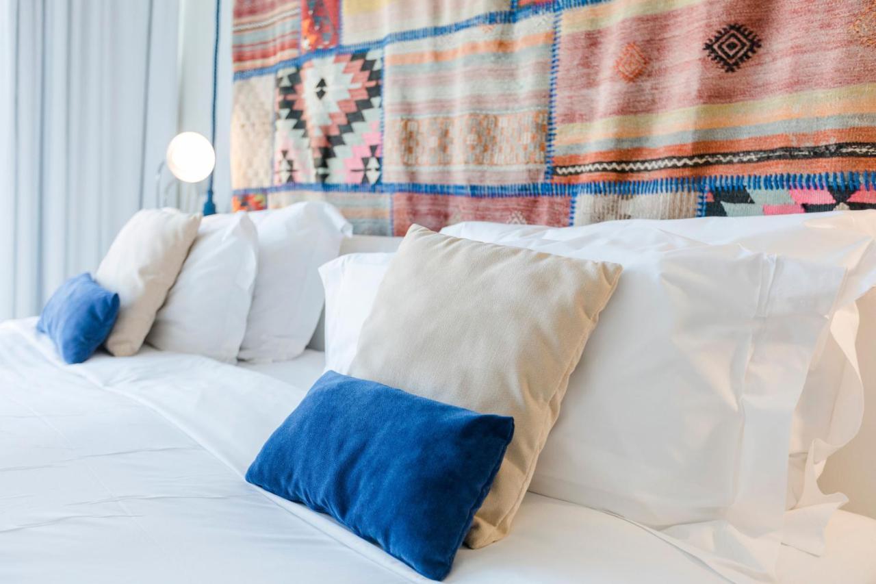 Royal Obidos Scenic Resort Praia del Rei Bagian luar foto A bed with cushions