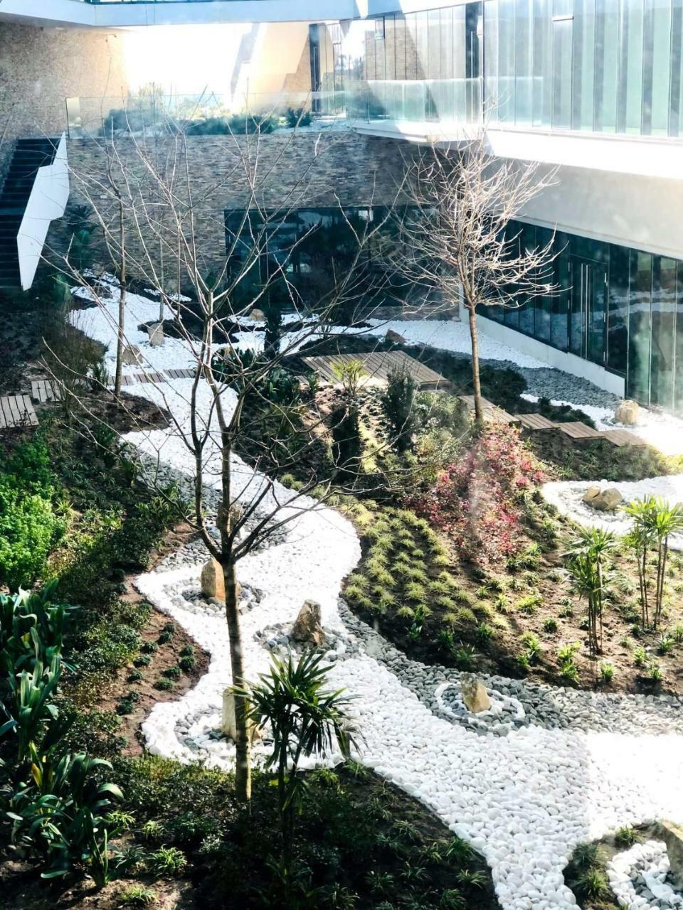 Royal Obidos Scenic Resort Praia del Rei Bagian luar foto The waterfall at the entrance of the building